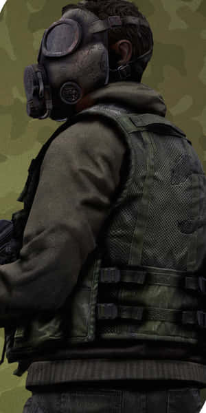 戴著防毒面具和戰術背心的士兵從後面看。 — 電玩遊戲 GIF 壁紙