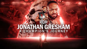 摔角手 Jonathan Gresham 在紅色競技場燈光下手持冠軍腰帶。 — 小精靈 壁紙