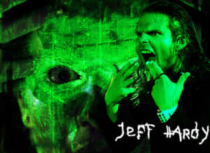 摔角手 Jeff Hardy 在綠色燈光下尖叫，帶有幽靈面孔疊加。 — 湯姆·哈迪 壁紙