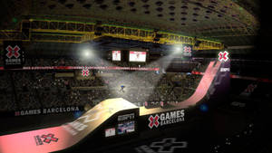 滑雪板運動員在燈光明亮的室內場館中於巴塞隆納X Games凌空飛躍。 — X Games 壁紙