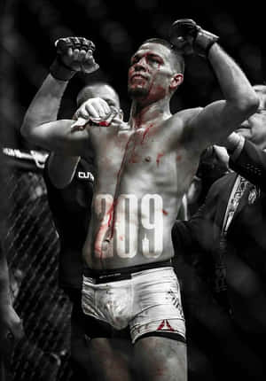 滿臉鮮血和軀幹的MMA拳手在八角籠內慶祝勝利。 — 終極格鬥冠軍賽 壁紙