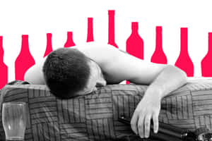 一名男子在床上睡覺，身後有紅色瓶子剪影。 — 醉意朦朧 壁紙