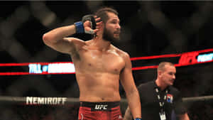 UFC 拳手在比賽期間於八角籠內擦拭汗水。 — 終極格鬥冠軍賽 壁紙