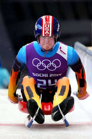 美國雪橇運動員在索契2014年冬季奧運會上沿著冰道飛馳。 — 極限運動 壁紙