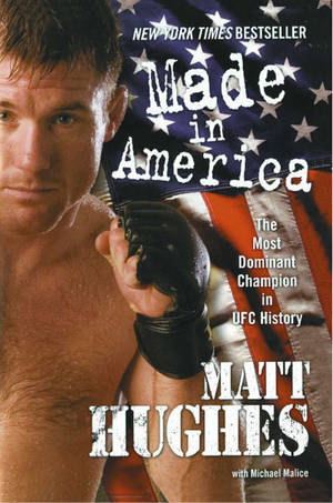 Matt Hughes 所著《Made in America》的書籍封面，展示一名肌肉發達的戰士戴著手套，背景為美國國旗。 — 運動 壁紙
