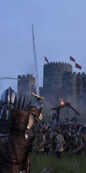 中世紀騎士和軍隊在石城堡附近準備戰鬥。 — 18:9 壁紙