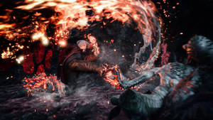 一名戰士在火焰爆炸中與惡魔生物戰鬥。 — 惡魔獵人5 壁紙
