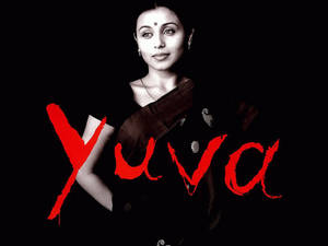 深色紗麗女性，黑色背景上帶有紅色Yuva文字 — Maa Durga 壁紙