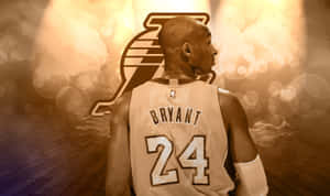 身穿Bryant 24球衣的籃球運動員在木地板上，帶有湖人隊標誌。 — 湖人隊標誌 壁紙