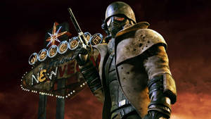 一名重裝士兵在發光的 New Vegas 標誌前手持手槍。 — 異塵餘生：新維加斯 壁紙