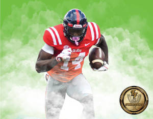 足球運動員身穿紅色球衣在綠色煙霧背景中帶球奔跑。 — Dk Metcalf 壁紙