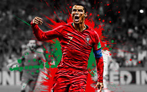身穿紅色葡萄牙球衣的足球員以顏料飛濺慶祝。 — Cristiano Ronaldo 足球 壁紙