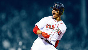 身穿紅襪隊球衣的棒球選手在夜間比賽中慶祝勝利。 — 酷棒球 壁紙