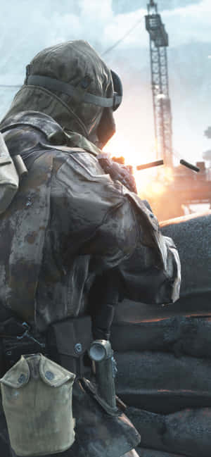 士兵在沙袋後方開火，工業戰區 — 電玩遊戲 GIF 壁紙