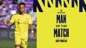 身穿黃色球衣的足球員獲選為Man of the Match。 — 運動 壁紙