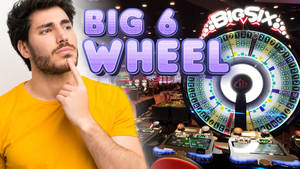 身穿黃色襯衫的男子在賭場Big Six輪盤遊戲旁思考。 — 簡約 壁紙