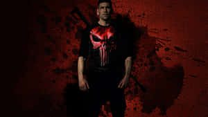 男子穿著骷髏襯衫，背景為紅色飛濺 — 制裁者 壁紙