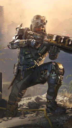 身穿未來戰鬥裝備的士兵在黃昏的沙漠中瞄準步槍 — 決勝時刻：黑色行動4 壁紙