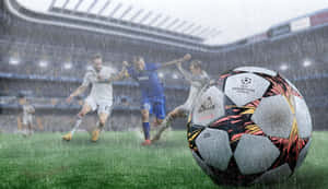 足球運動員在歐冠比賽期間於大雨中競爭。 — PC 遊戲 壁紙