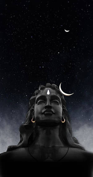 星空下戴著新月冠冕的濕婆石像 — Maa Durga 壁紙