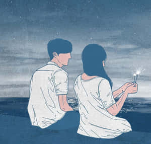 一對情侶坐在夜晚的海灘上，在星空下手持煙火棒。 — 情侶擁抱 壁紙