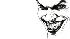 一個令人畏懼的卡通小丑，咧嘴大笑，露出尖牙。 — 黑白小丑 壁紙