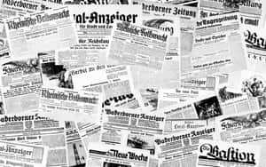 黑白拼貼中的復古德國報紙頭條。 — Old Paper 壁紙