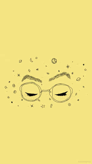 戴眼鏡的閉眼，周圍環繞著宇宙塗鴉，背景為黃色。 — 美學黃色 壁紙