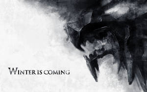 一隻帶有哥德字體 winter is coming 短語的威脅性冰龍。 — 冬季 壁紙