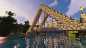 一座Minecraft橋樑橫跨河流，黃昏時火炬點亮。 — 塔橋 壁紙