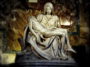 瑪利亞在大理石 Pietà 雕塑中抱著耶穌的軀體。 — 美學大理石 壁紙
