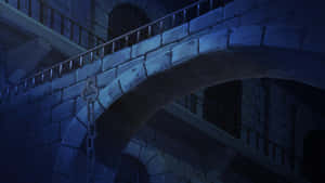 夜間帶鐵鏈的石橋，位於有欄杆的建築之間 — 1920x1080 壁紙