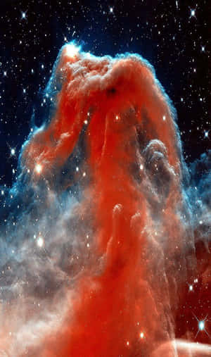 一座充滿活力的紅色和藍色宇宙柱，在深空中與星星一起發光。 — 星際效應 壁紙