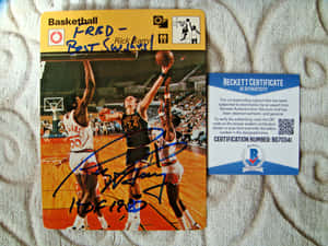 簽名Rick Barry籃球照片，附Beckett證書，置於紋理毛毯上。 — NBA 壁紙