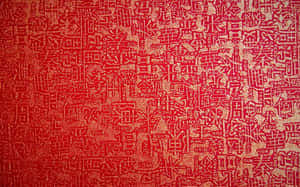 紅色壁紙，帶有金色中文字，呈現華麗書法圖案。 — 日式粉紅 壁紙