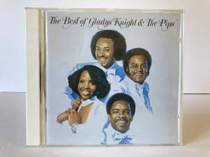 Gladys Knight and The Pips 穿著藍色西裝微笑的CD封面。 — 音樂 壁紙