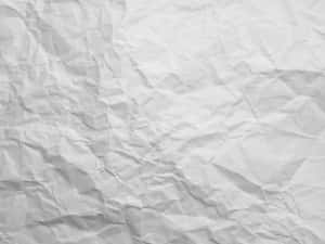 皺巴巴的白紙紋理，帶有柔和陰影和摺痕。 — Old Paper 壁紙
