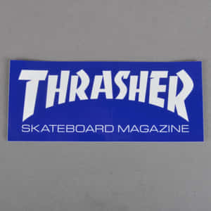 灰色背景上的藍色Thrasher Skateboard Magazine貼紙 — Thrasher 壁紙