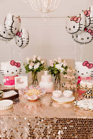 Hello Kitty主題派對桌，配有粉紅色蛋糕、氣球和鮮花。 — 凱蒂貓 美學 GIF 壁紙