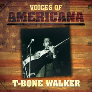 T-Bone Walker 在舞台上彈吉他，背景為木星星。 — 音樂 壁紙