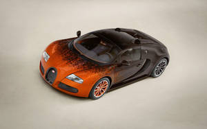 橙色和黑色的Bugatti Veyron超級跑車在攝影棚燈光下。 — Bugatti iPhone 壁紙