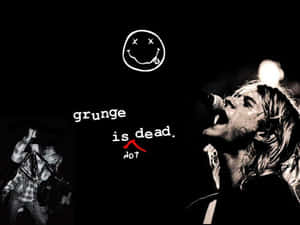Kurt Cobain 與Nirvana笑臉和文字grunge is dead not一起唱歌。 — 涅槃 壁紙
