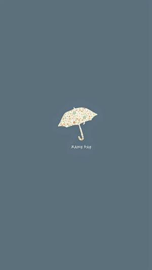 一把帶有「RAINY DAY」文字的花卉圖案雨傘，背景為藍灰色。