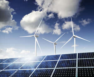 藍天白雲下的太陽能板和風力發電機。 — 能量 壁紙