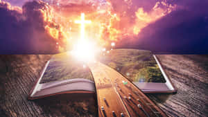 打開的書，高速公路通往夕陽天空下發光的十字架。 — 耶穌十字架 壁紙