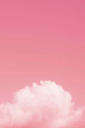 一朵蓬鬆的白雲，襯托著柔和的粉紅色天空 — 粉紅色美學桌面 壁紙