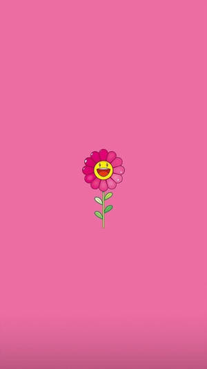 一朵微笑的卡通花，粉紅色花瓣，在粉紅色背景上。 — Tumblr 花朵 壁紙