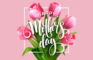 Happy Mother's Day 祝福，粉紅色鬱金香和綠色葉子放在白色框架中。 — MacBook Pro 壁紙