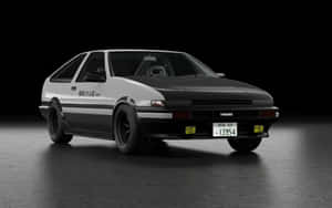 黑白豐田AE86跑車，帶有日文字和黃色頭燈，在黑暗的攝影棚中。 — 豐田 壁紙