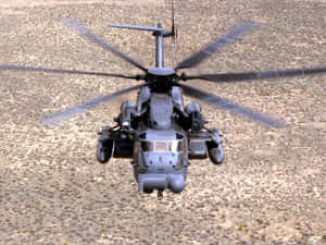 軍用直升機在礫石地形上空盤旋 — 直升機 壁紙